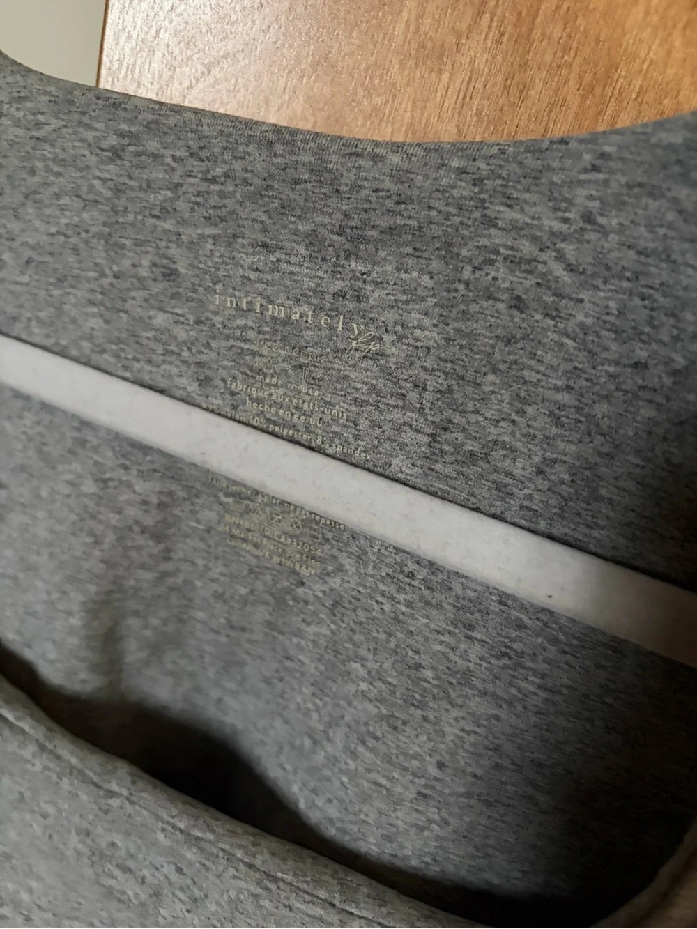 Free People Clean Lines Sunfaded Baby Tee in gray